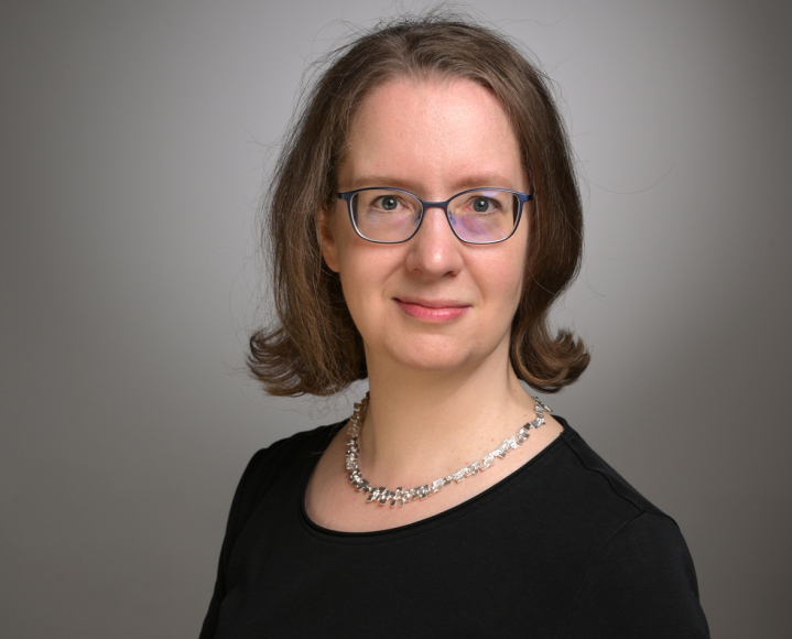 author portrait deep blue tone